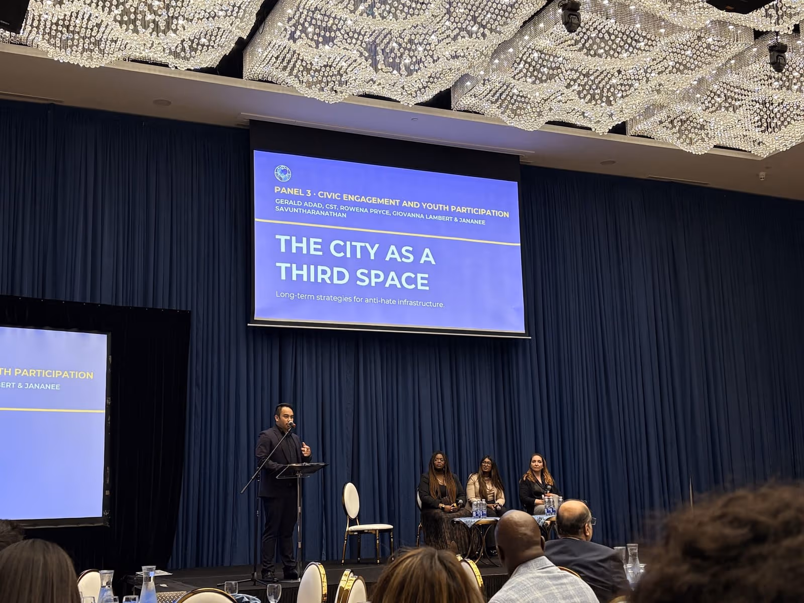 Gerald Adad speaking on a community safety panel
